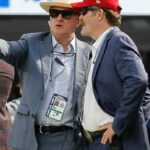 J. Patrick Johnson standing with NFL Staff